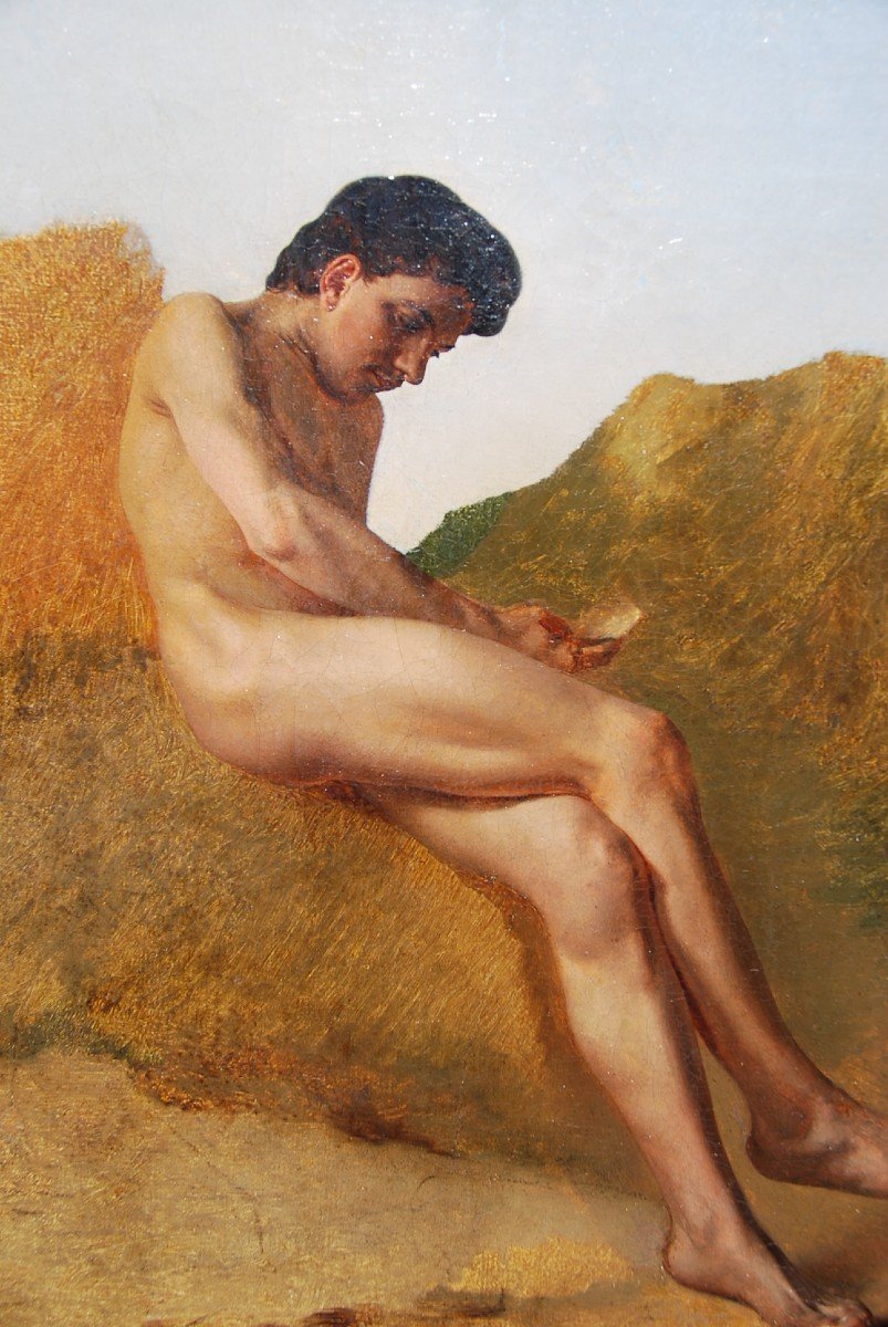 Jeune Homme Assis Sur Des Rochers1