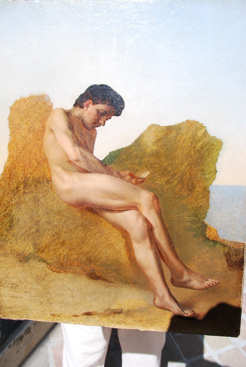 Jeune Homme Assis Sur Des Rochers5